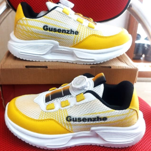 Kids’ sneakers featuring a bright yellow and white color combination